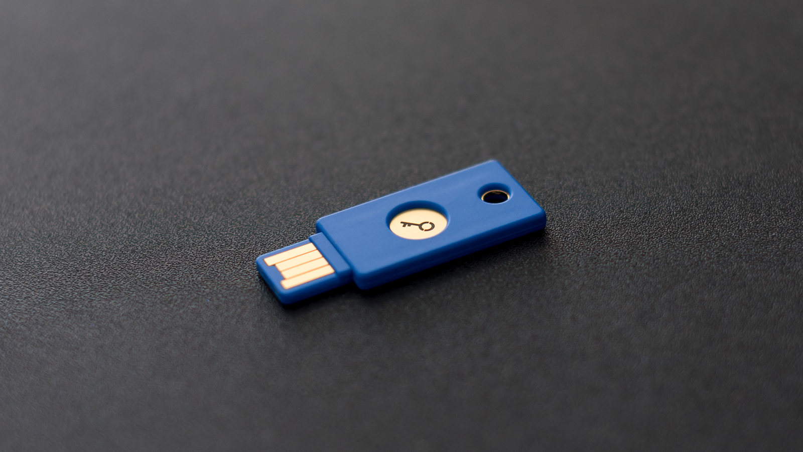 USB security key on dark background