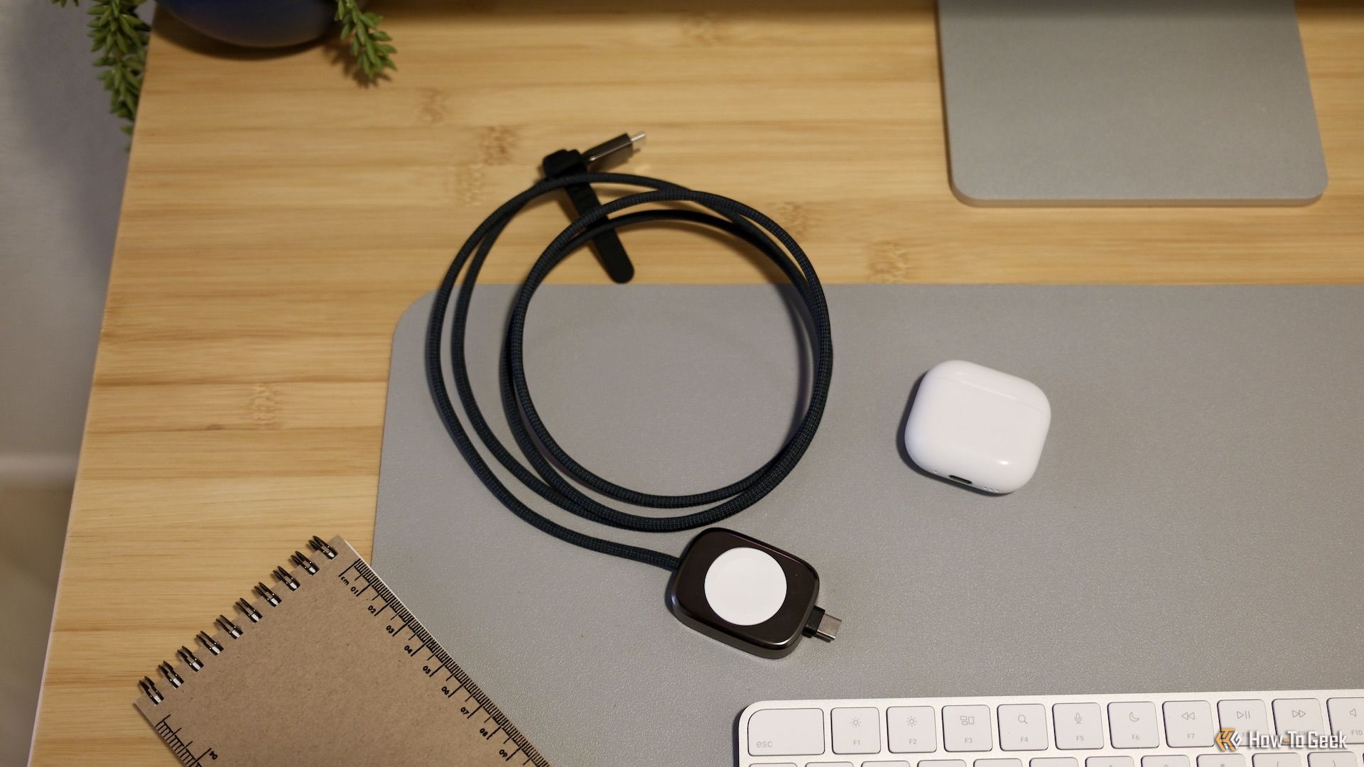 The Nomad hybrid Apple Watch and USB-C charger on a desk.