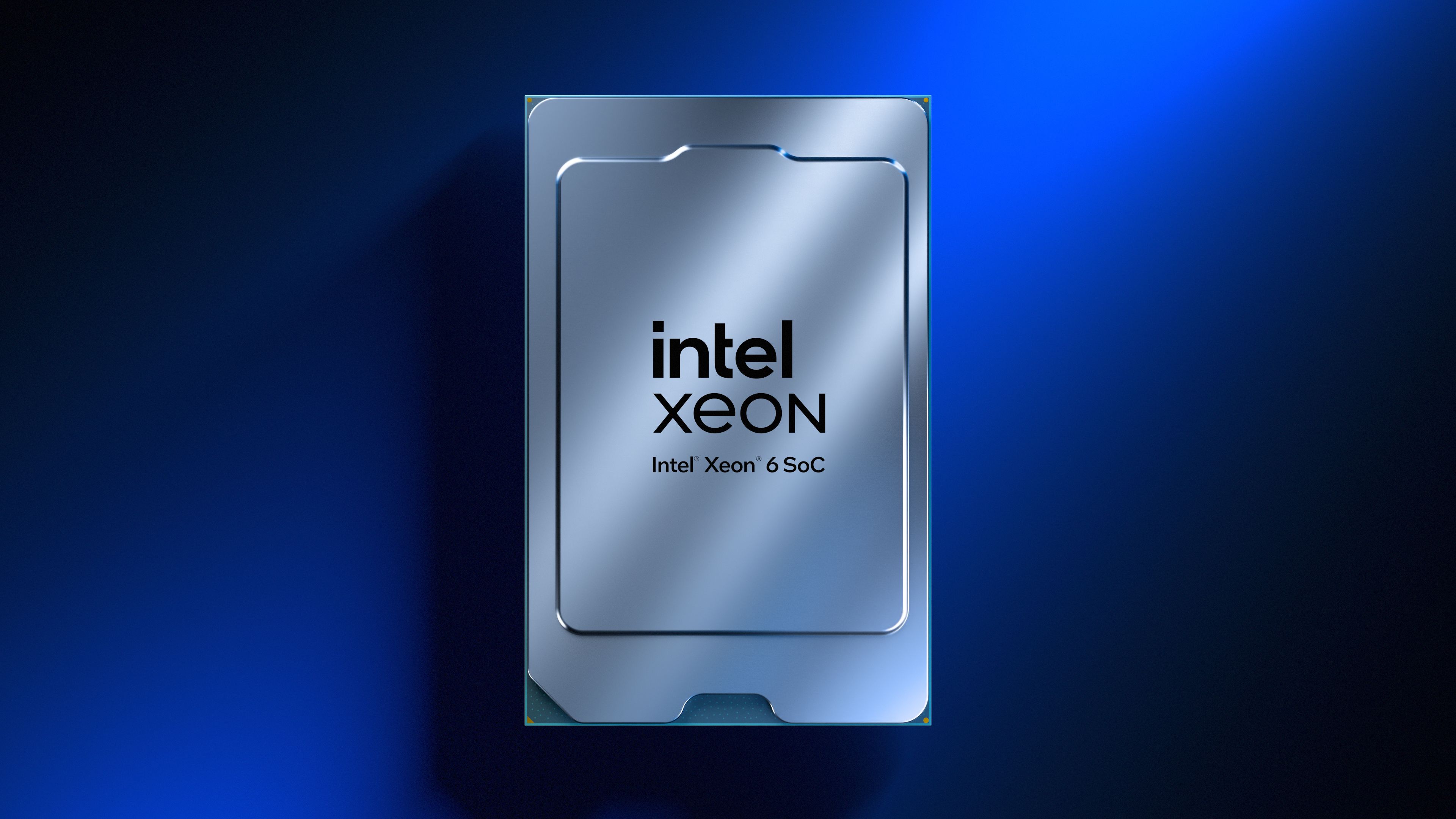 A sleek silver Intel Xeon processor on a gradient blue background.