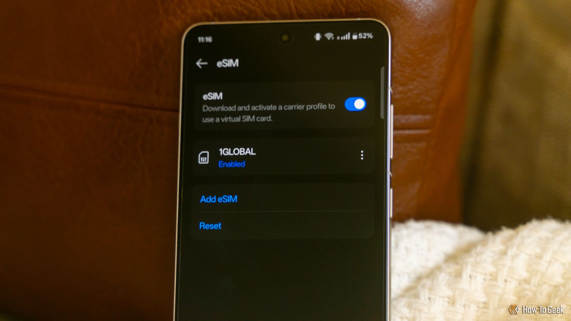 The eSIM settings menu on an Android smartphone showing the Saily eSIM enabled.