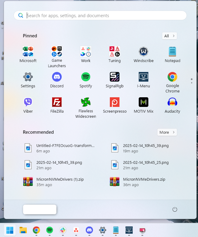 The Windows 11 Start menu with numerous apps organized.