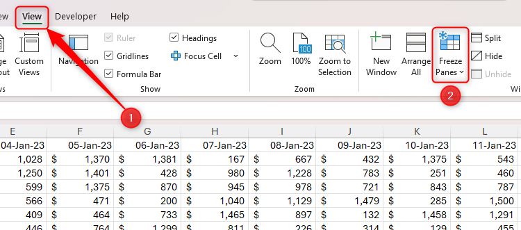 The Freeze Panes button in the View tab on Excel's ribbon is highlighted.