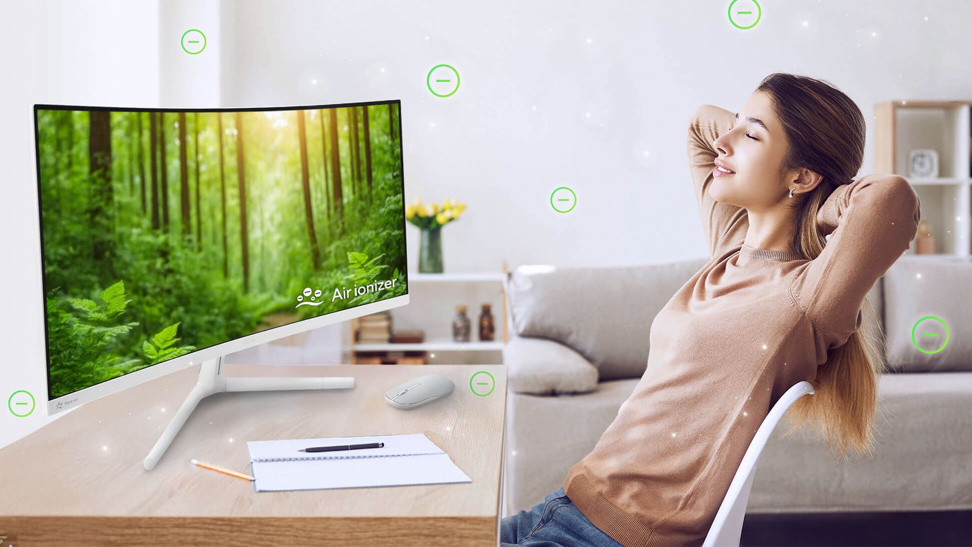 Person sitting in front of the ASUS Air Ionizing Monitor, breathing deeply.