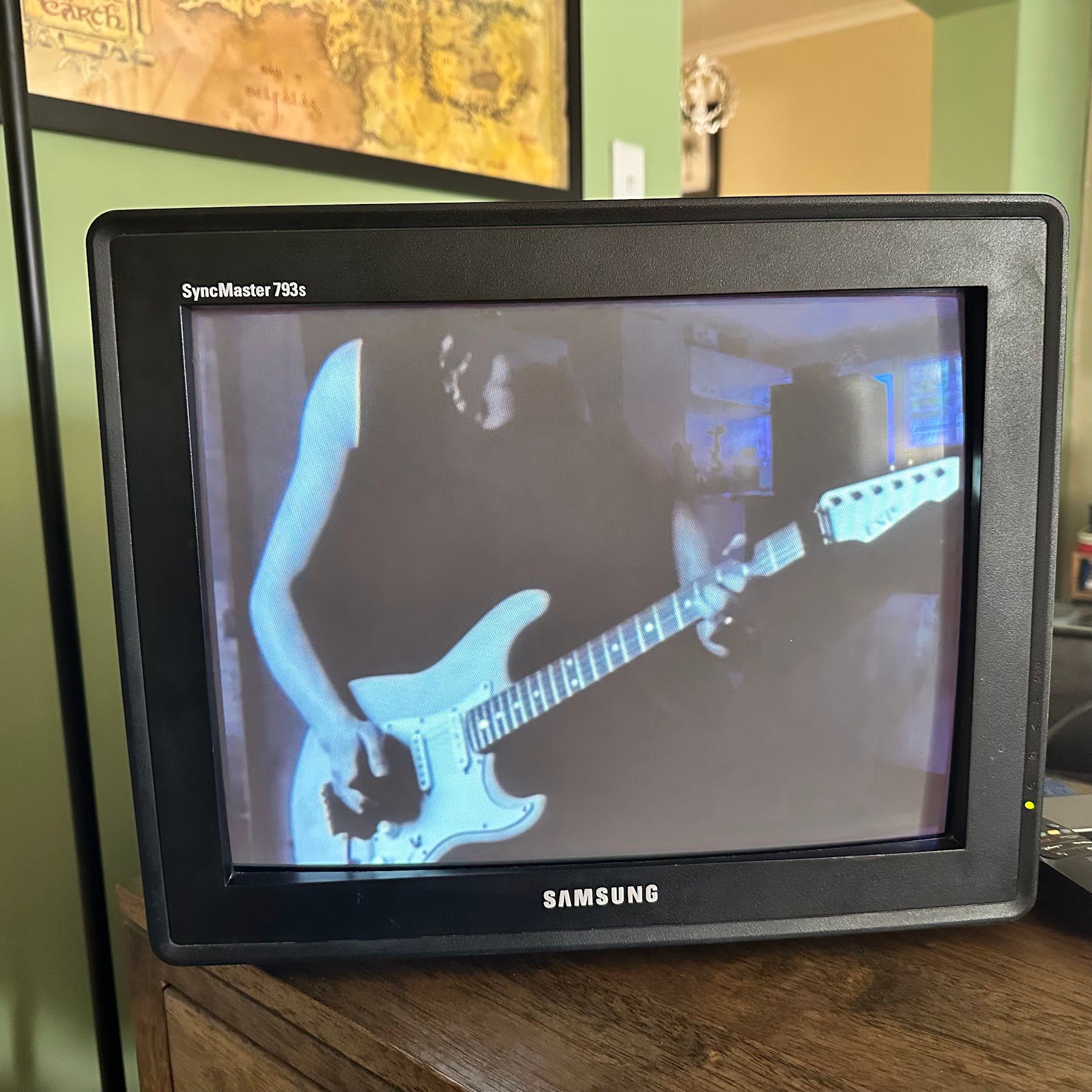 A scene from Metallica's One music video on a CRT monitor.