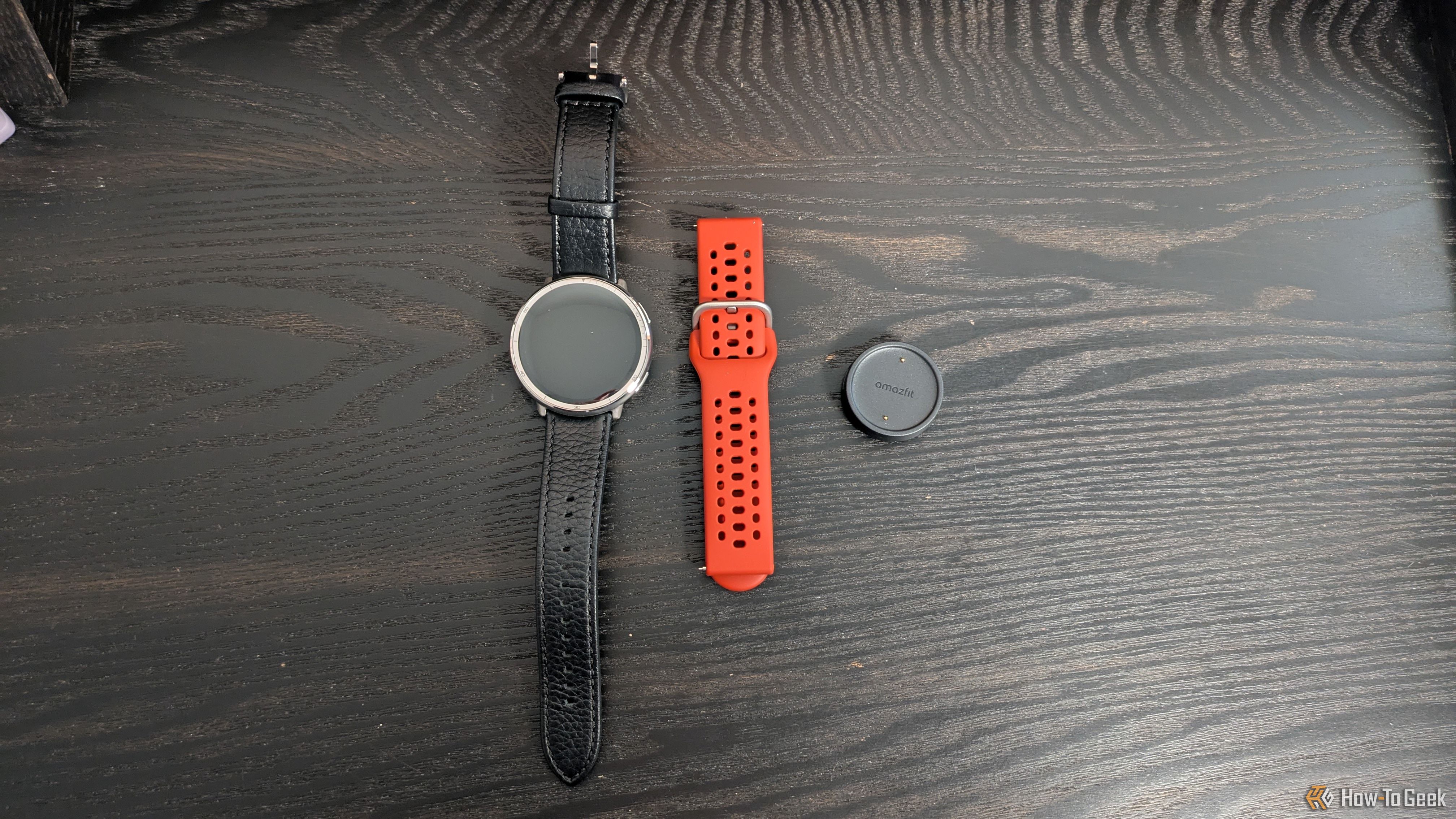 Amazfit Active 2 with extra band and charging pad.