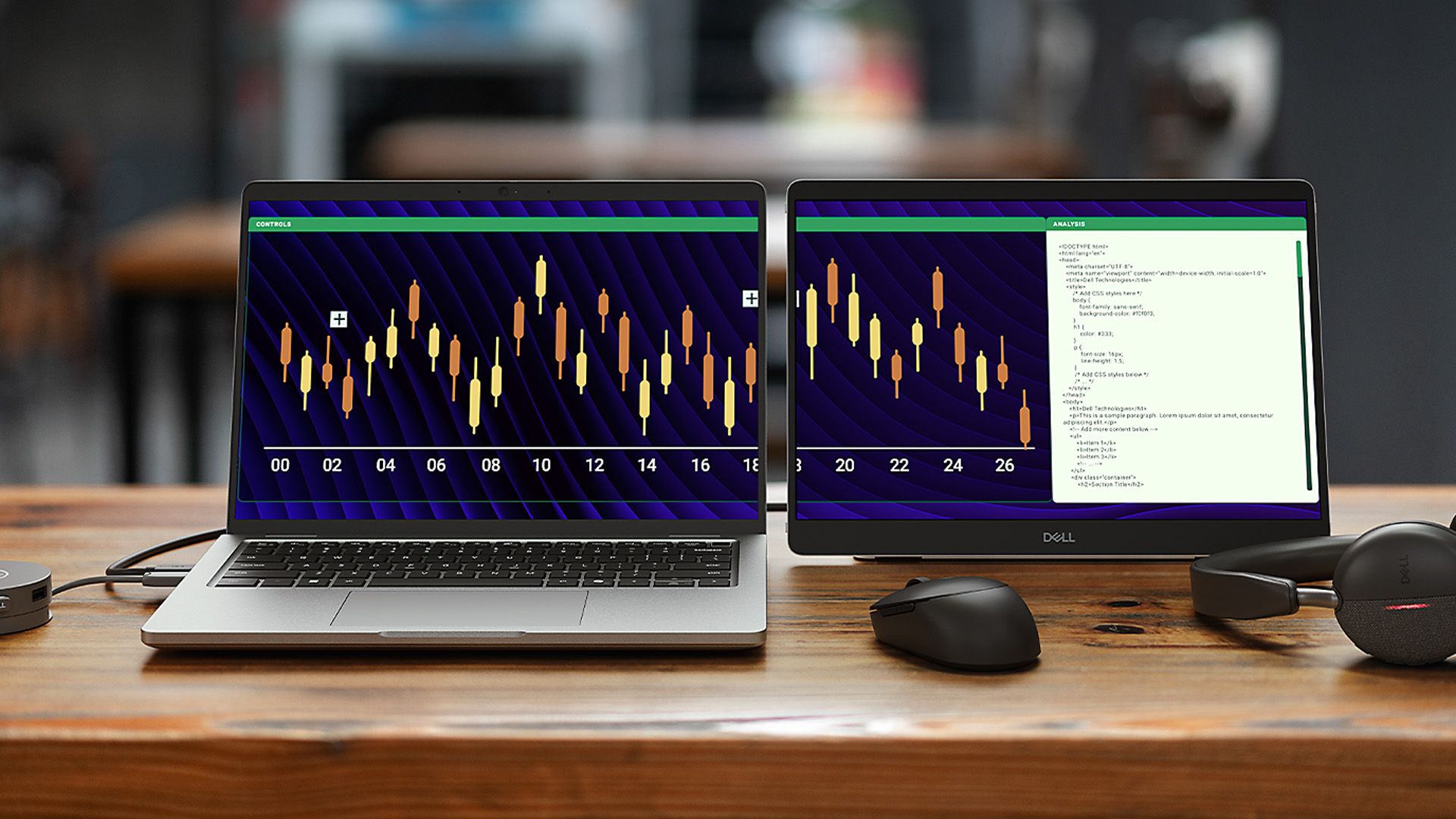 A laptop on a desk with a Dell portable monitor connected on the side.