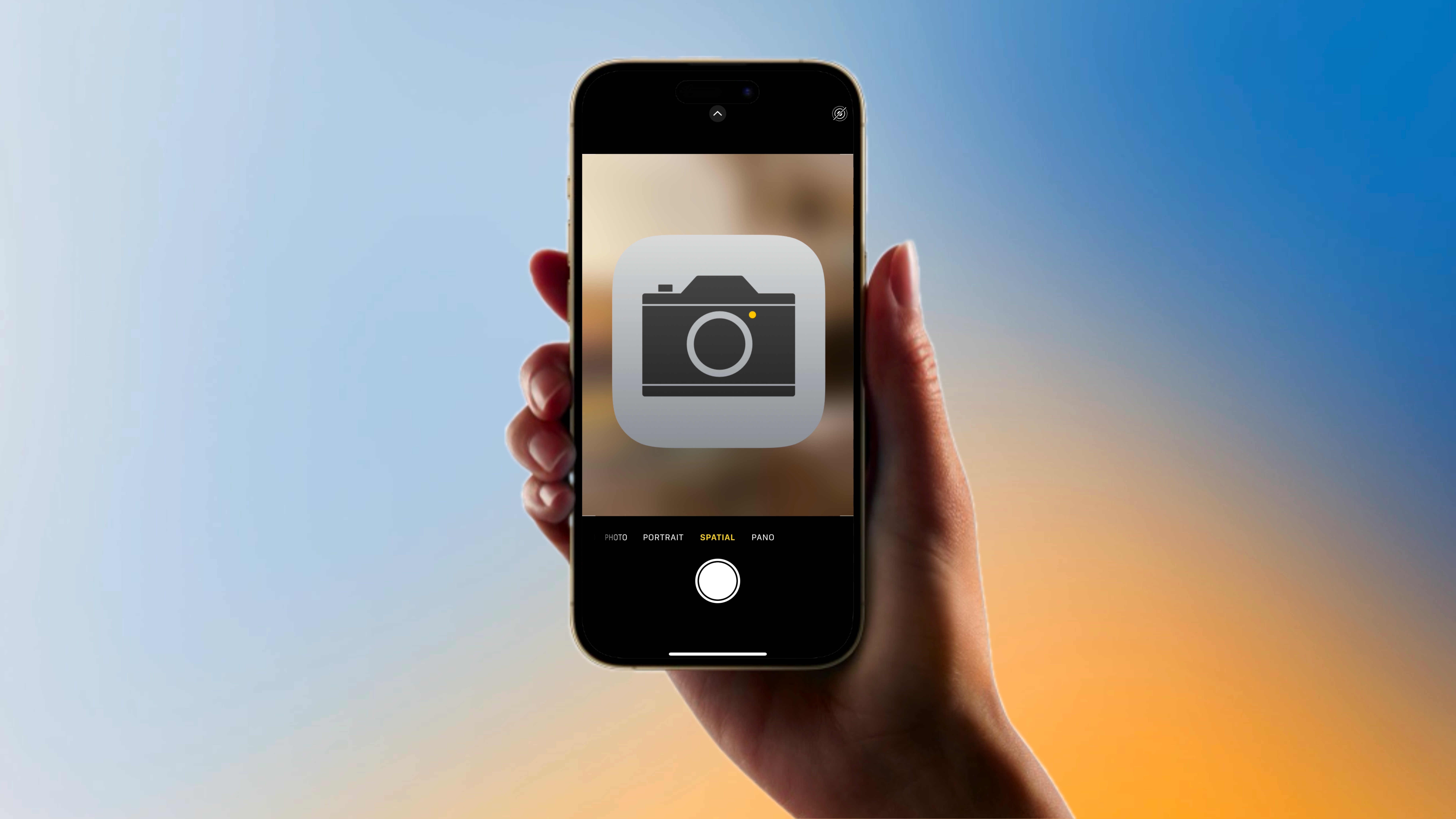 iPhone with camera icon in front of a colorful background.