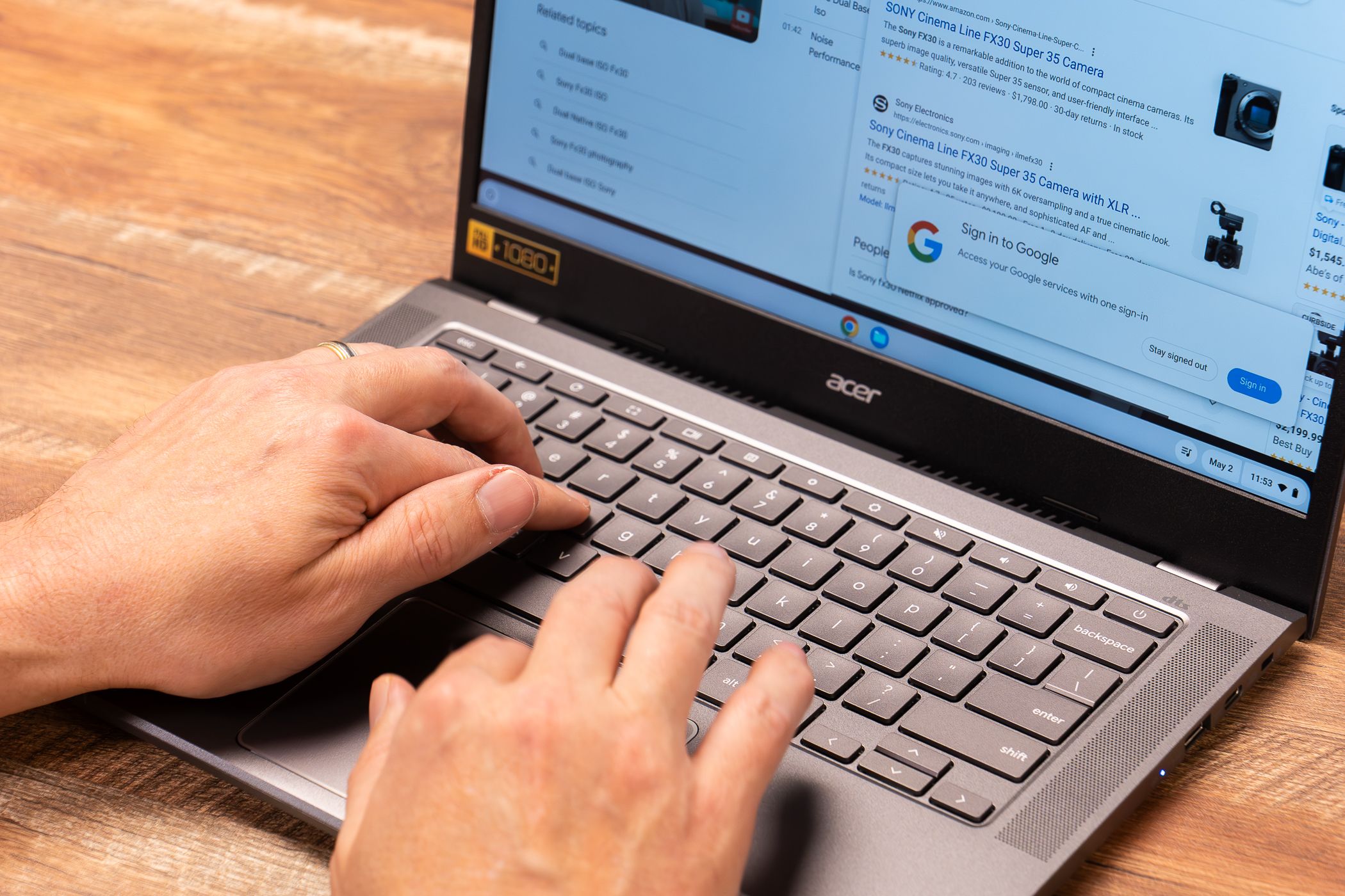 A pair of hands typing on an Acer Chromebook Plus laptop.