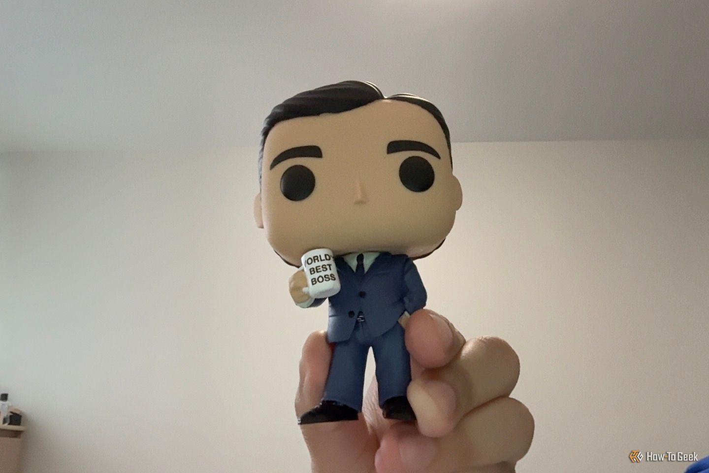 M4 MacBook Air CenterStage photo of Michael Scott Funko Pop.