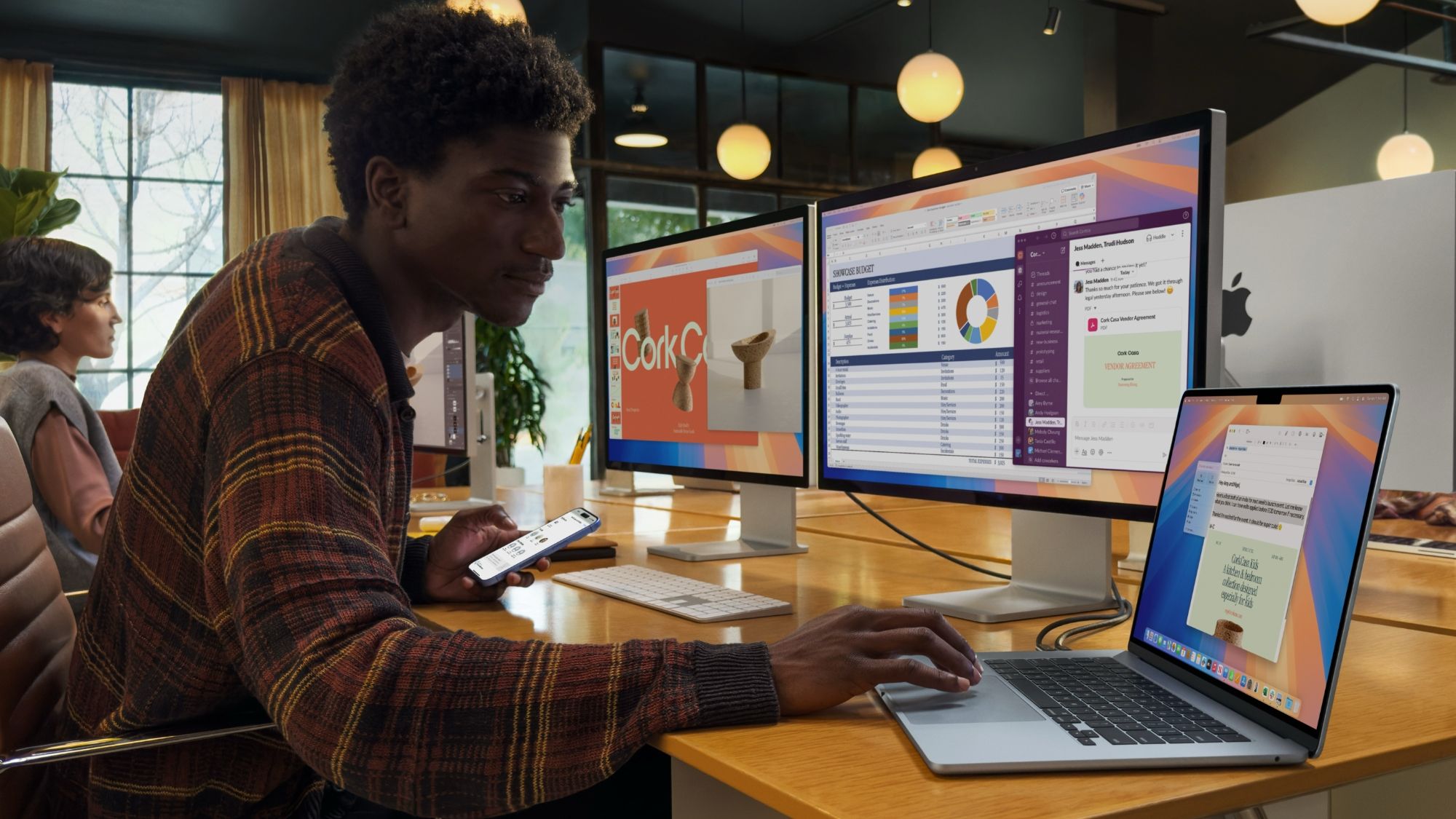 Man using a 2025 MacBook Air.