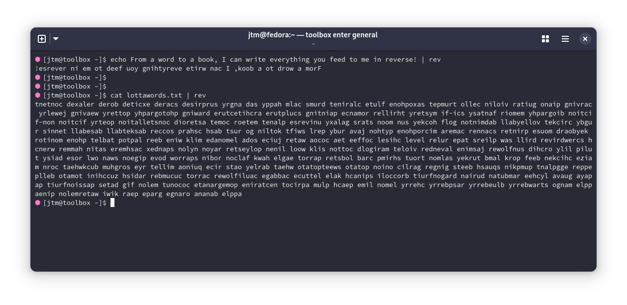 Output from the rev command running on a text file in a Linux terminal