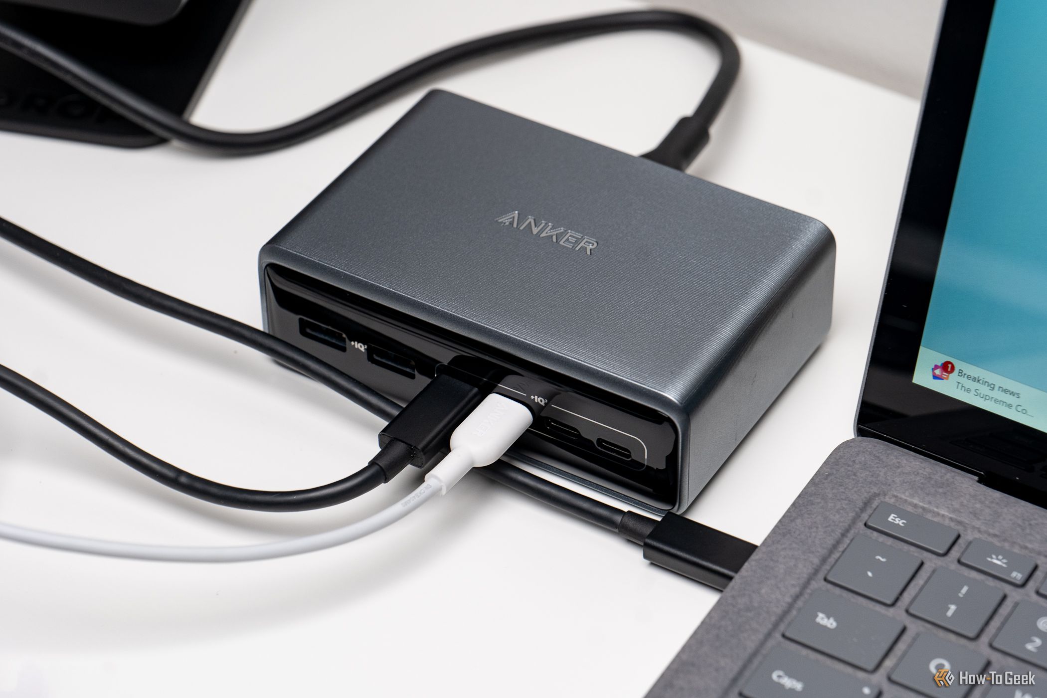 The Anker Prime 6-in-1 Charger with a charging cables connected.